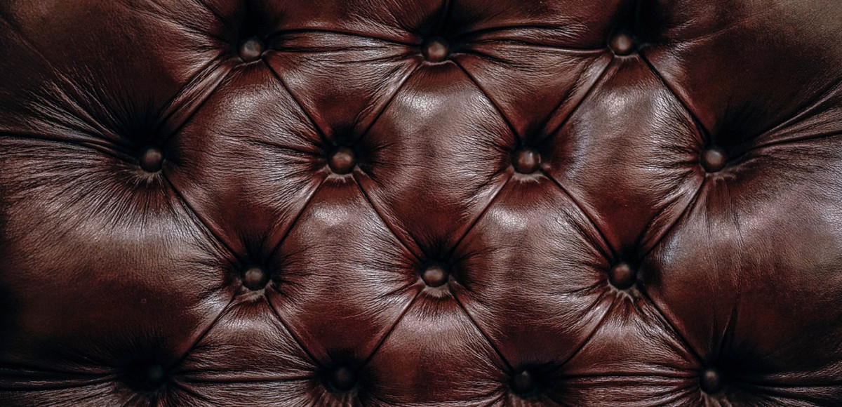 Brown leather sofa back