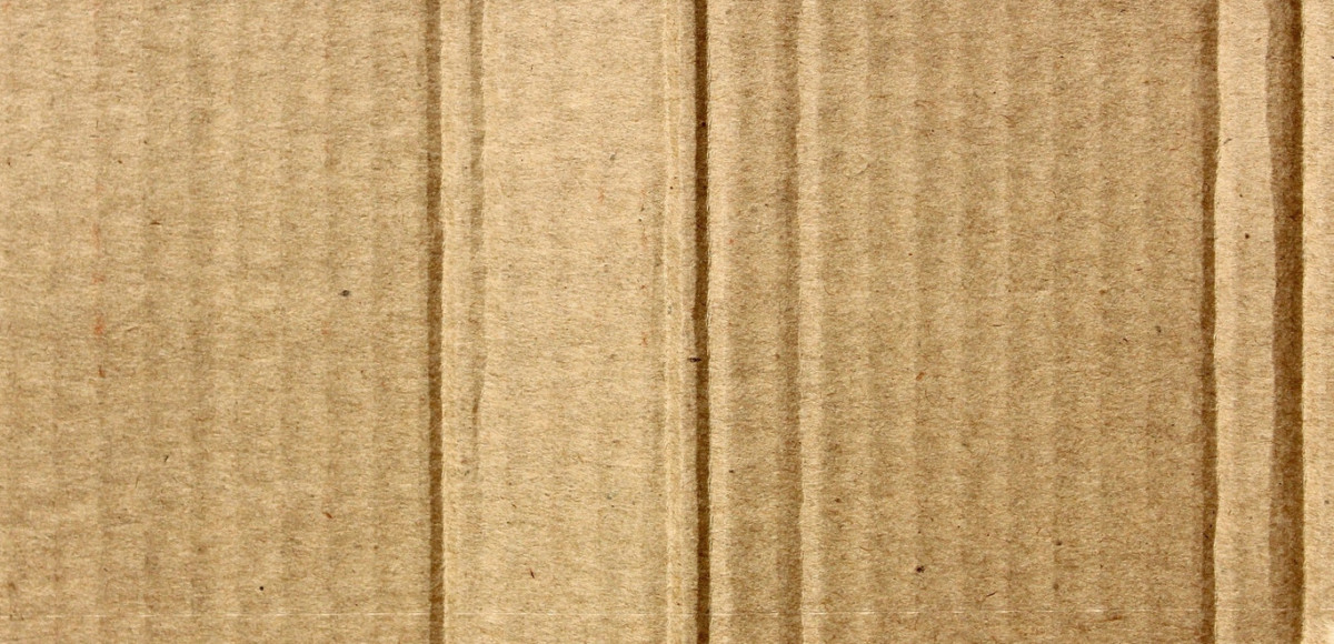 Up-close shot of textured brown cardboard box
