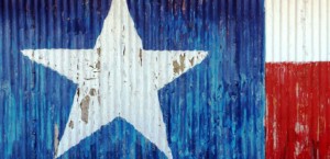Texas flag painted on corrugated metal wall