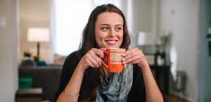 Female college student sipping coffee