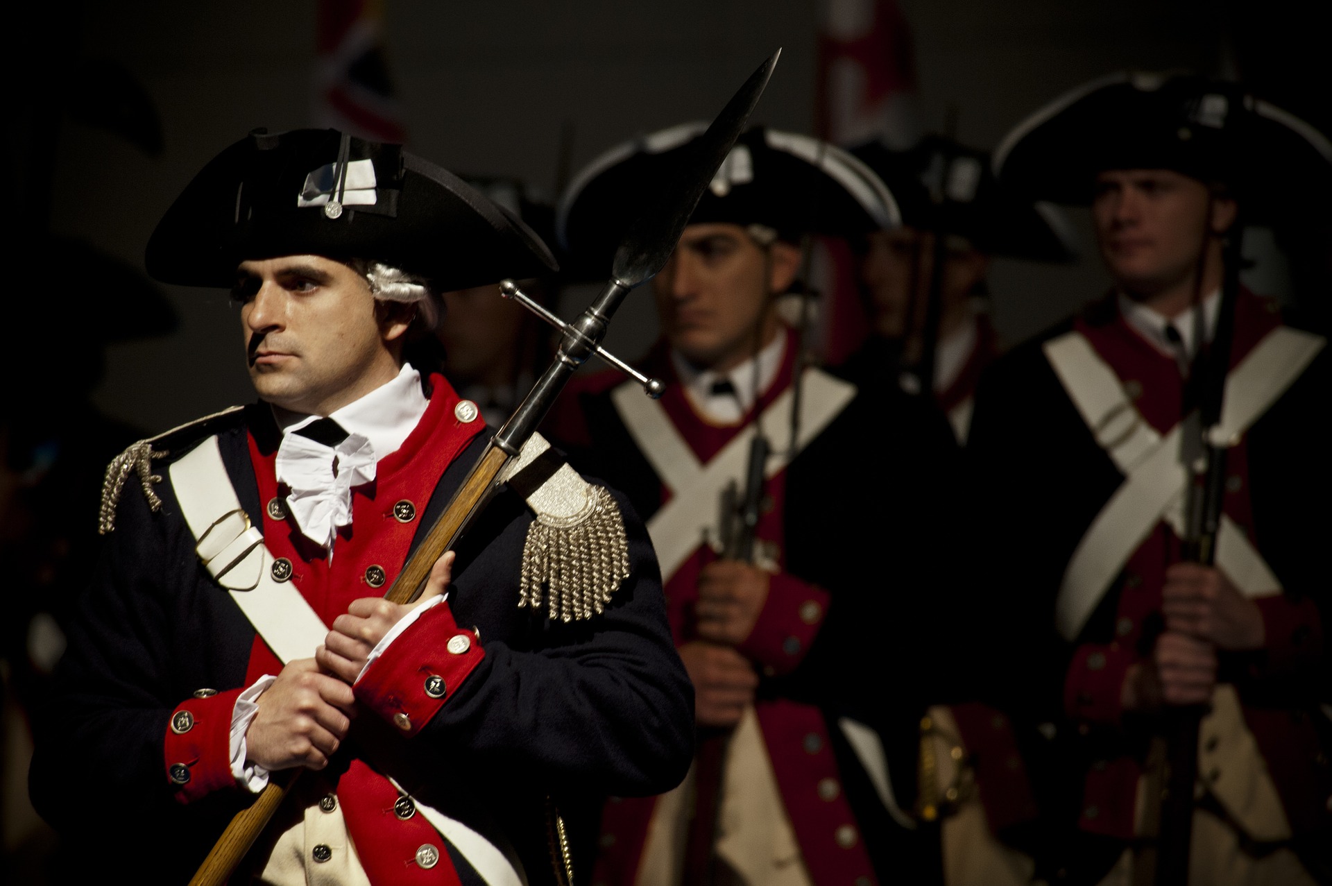 Revolutionary war monuments and reenactments, soldiers holding weapons