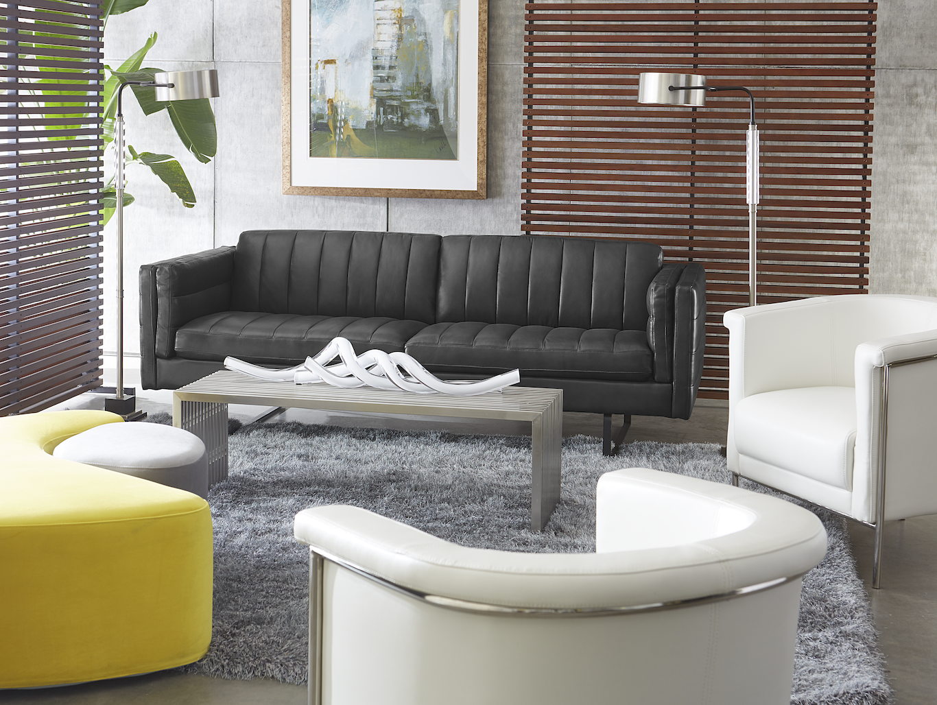 Lagom interior design with black couch, white chair and rug