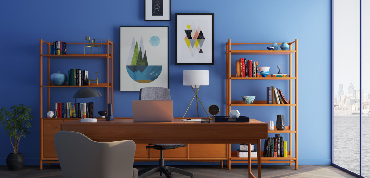 Shelves, plants, books, artwork, and other items in a blue home office