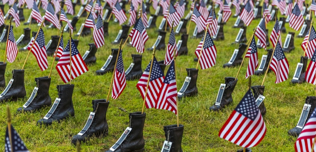 American flags in a military cemetery.