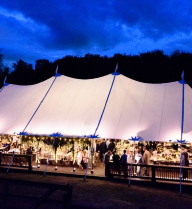 White party tent on summer evening