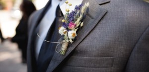 Close up of boutonniere made from dried flowers