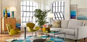Light and airy room with chairs and two paintings