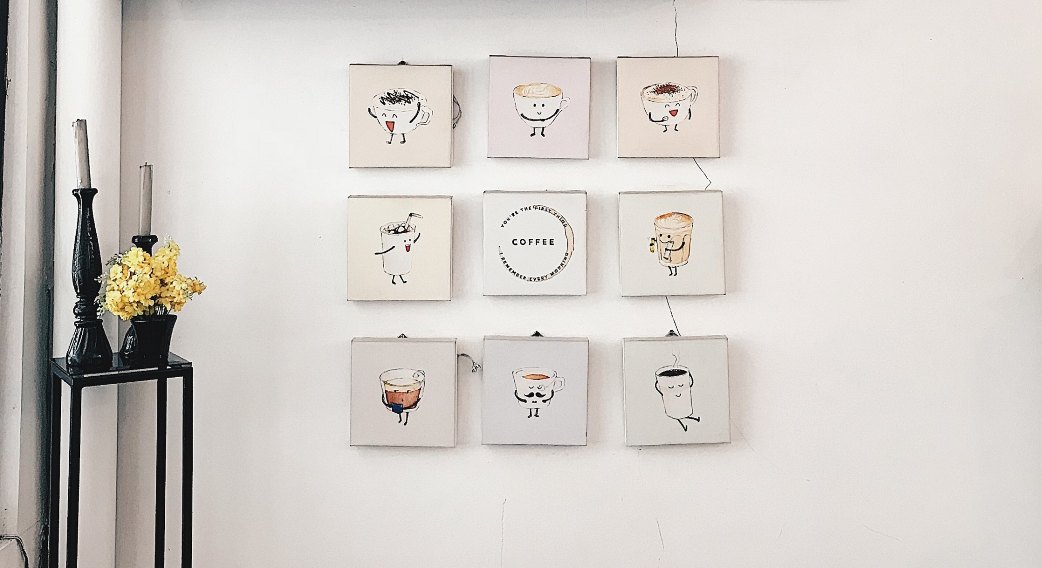 Grid-style gallery wall idea featuring small canvas prints of teacups