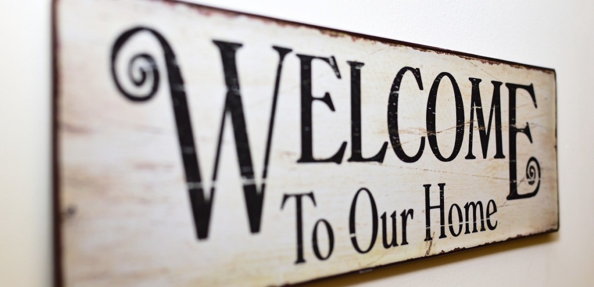 Sign that reads "welcome to our home"