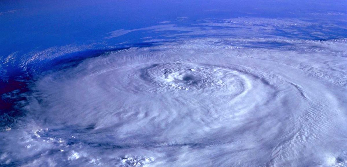 Aerial view of hurricane circling over the ocean