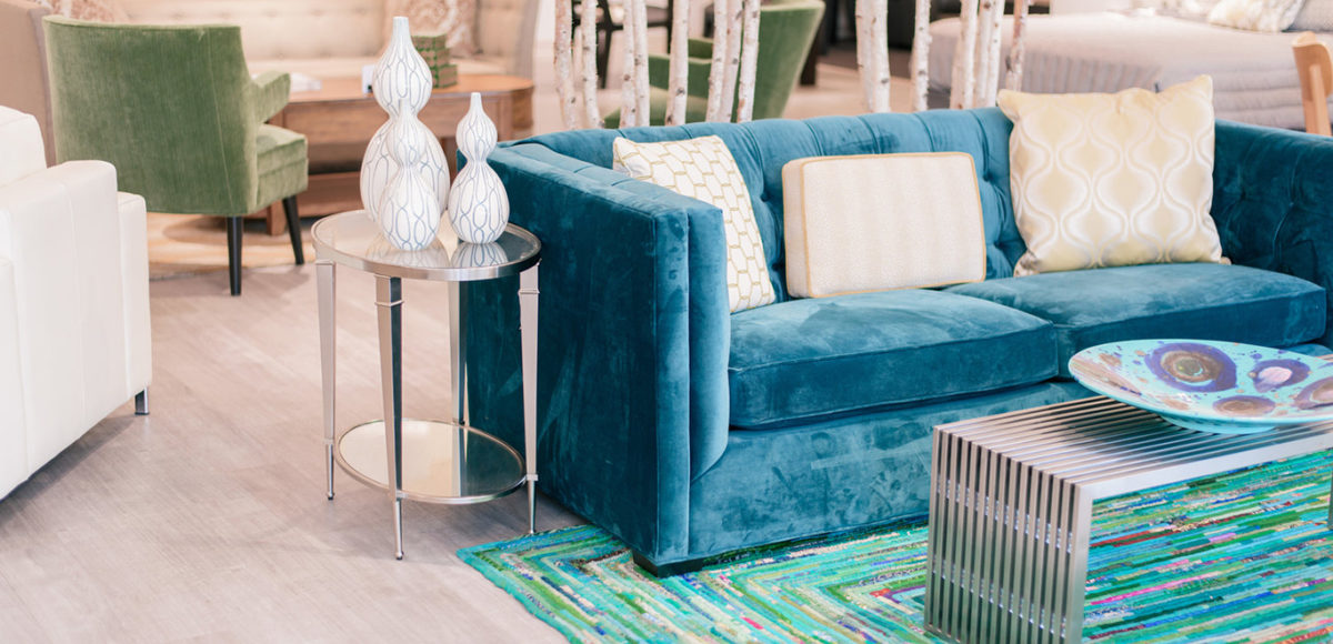 CORT Showroom with blue velvet couch