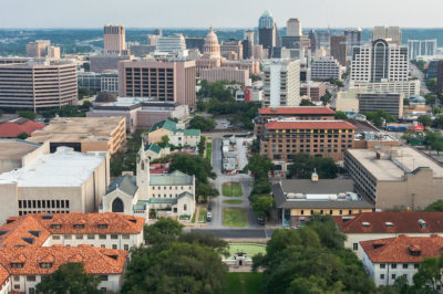 An aerial shot of UT Austin overlooking Austin, Texas.