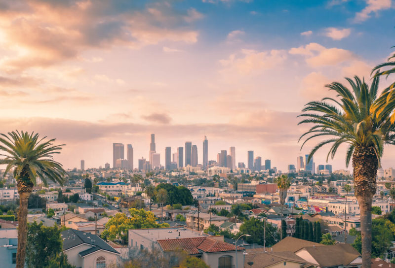 Skyline view of Los Angeles Downtown at sunset after moving to California.