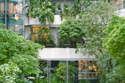 Green apartment building reducing carbon footprint with rental lifestyle and furniture rental