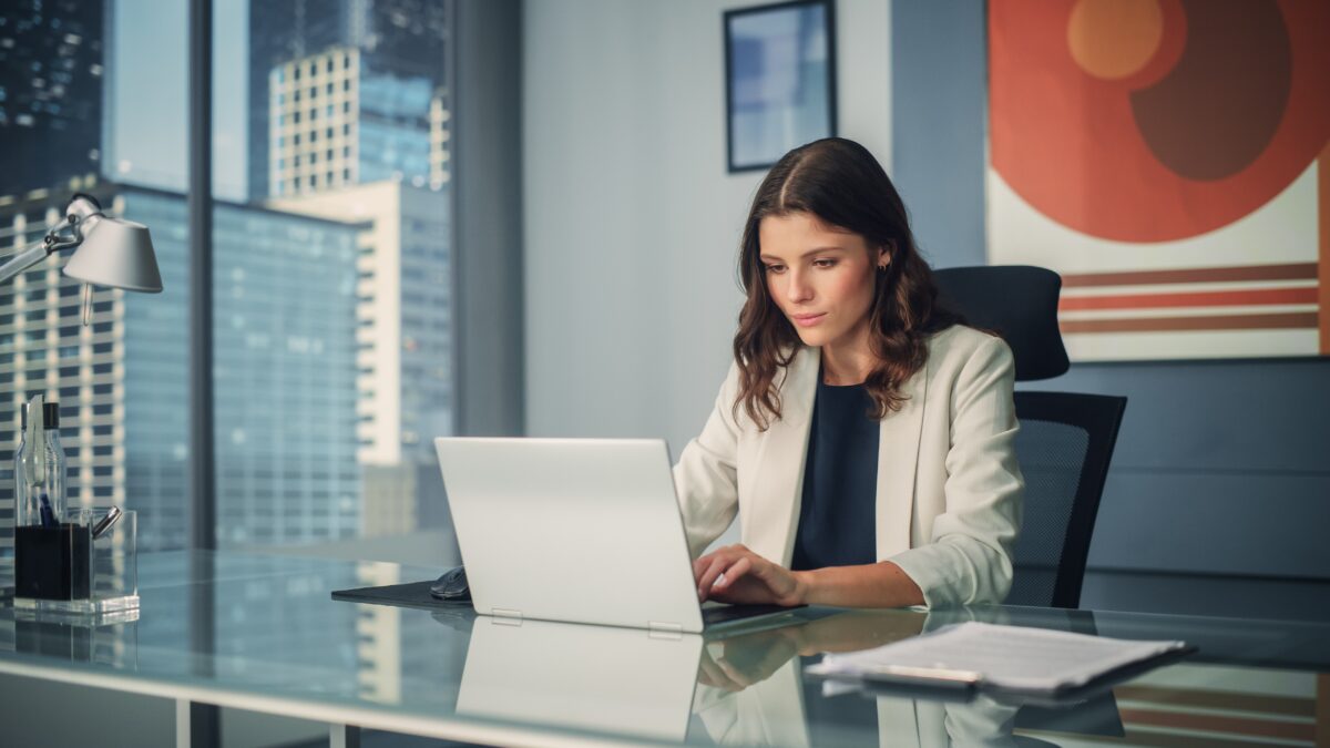 Woman sitting in executive office space