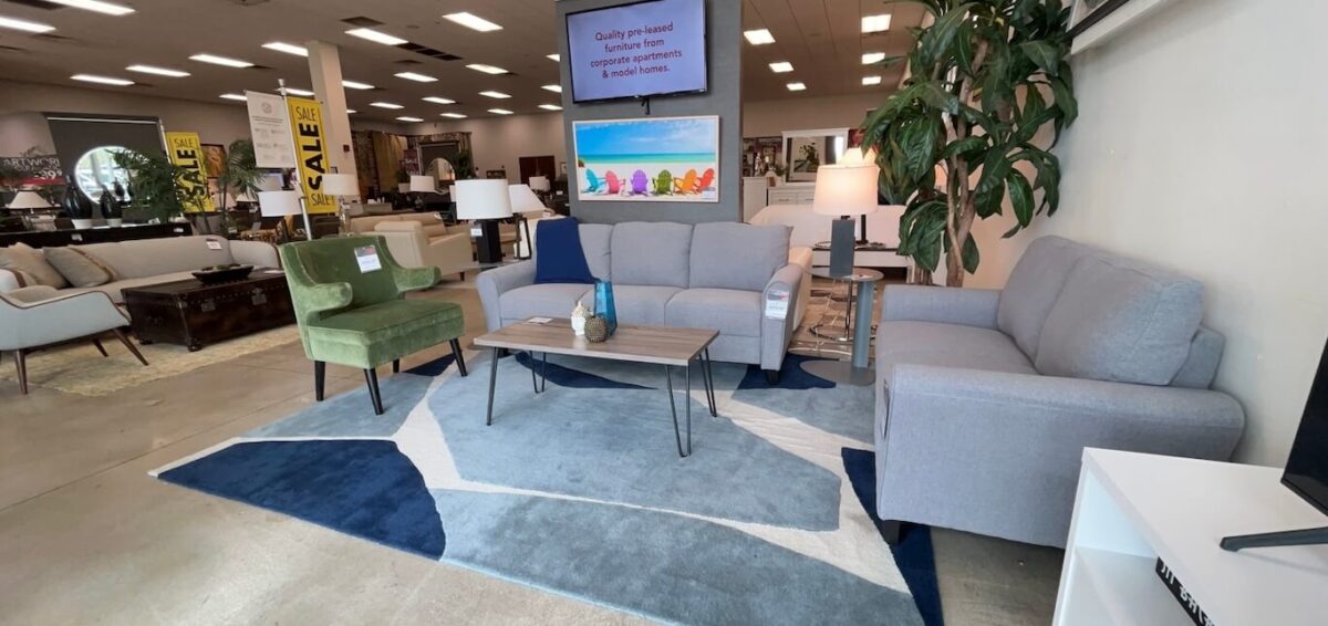 A CORT furniture showroom with a large selection of furniture available.